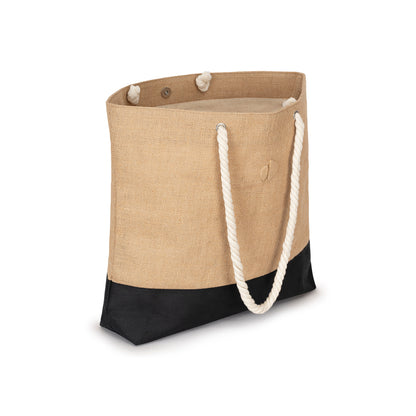 Beige tote bag with black base and white rope handles on a white background