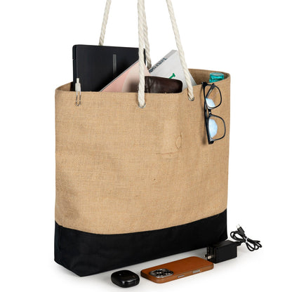 Beige tote bag with black bottom section, containing electronic devices on a white background