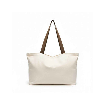 Beige tote bag with brown straps on a white background