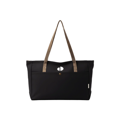 Black tote bag with brown straps on a white background